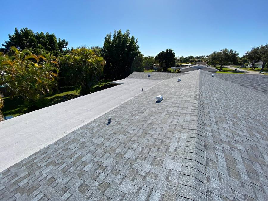 New asphalt shingle and flat roof installation in Deerfield Beach, FL — Broward Roofing Pros