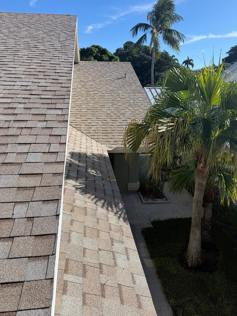Asphalt shingle roof replacement with clean ridge lines in Wilton Manors, FL — Broward Roofing Pros